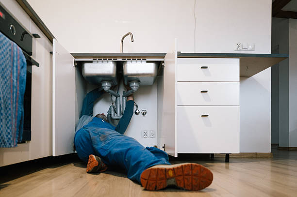 Professional Plumbing technician working in Marion, CT